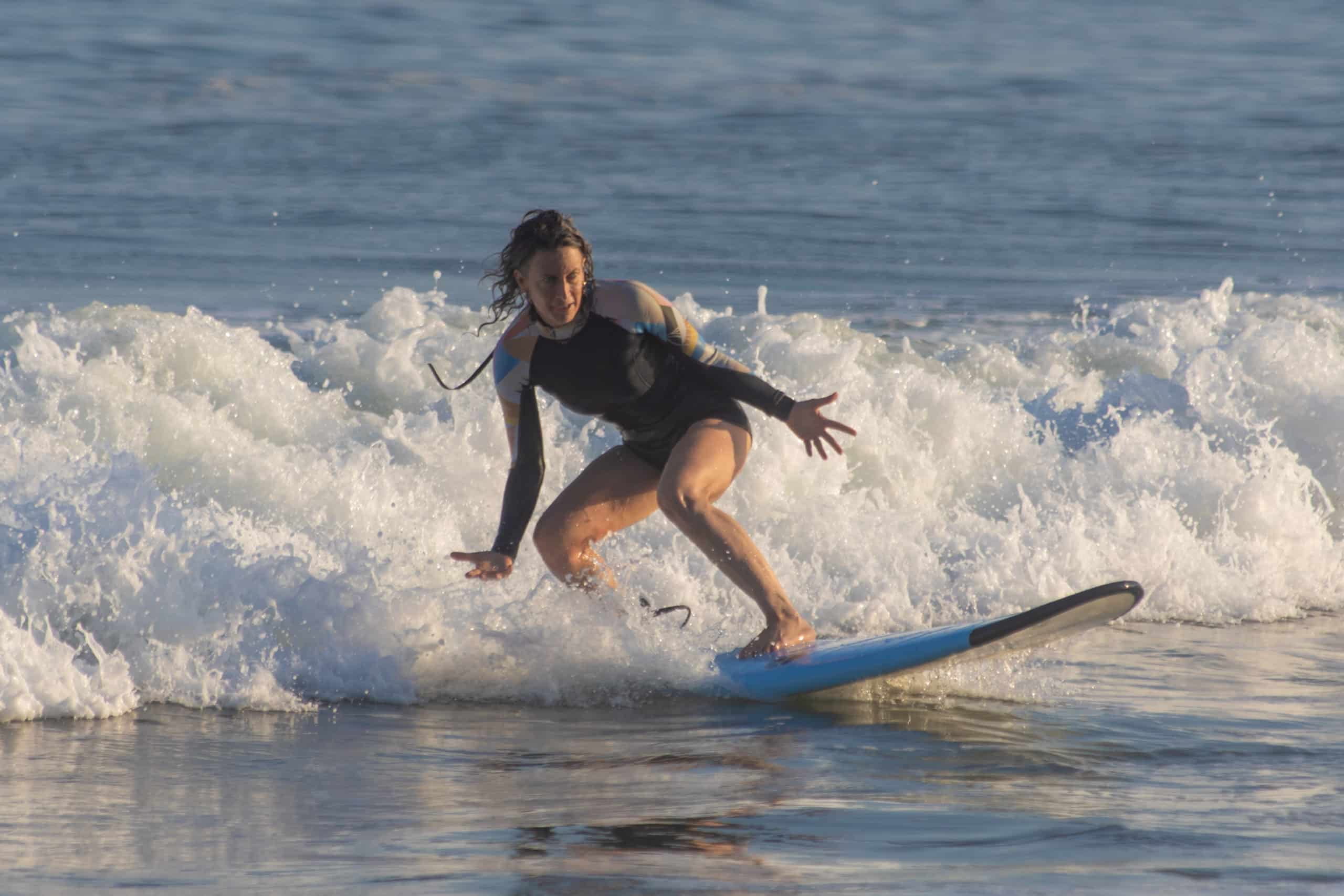 Danielle Cass surfing in California